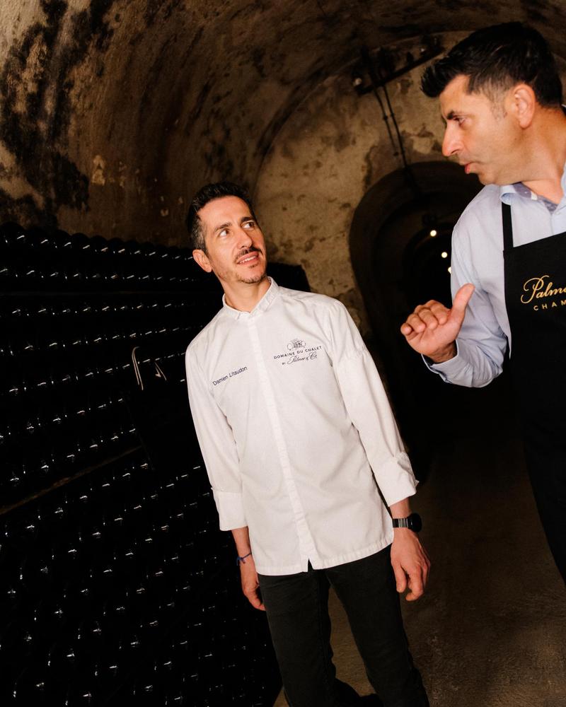 Xavier Berdin and Damien Litaudon exploring the cellars of Champagne Palmer & Co