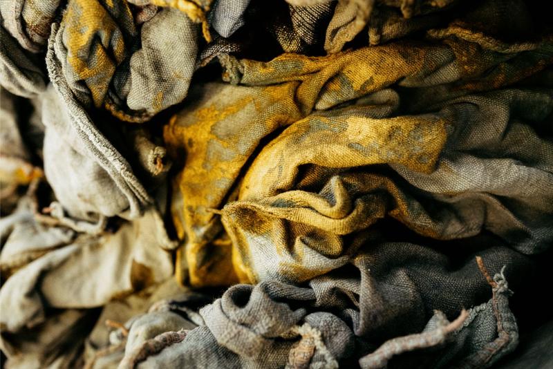 Close up of dirty rags inside print shop paint rag bin