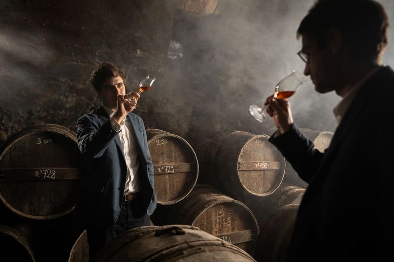 Landscape of Noé Tesseron with Cellar Master Romain Martial of Cognac Tesseron tasting a glass of Tesseron Experience 01.